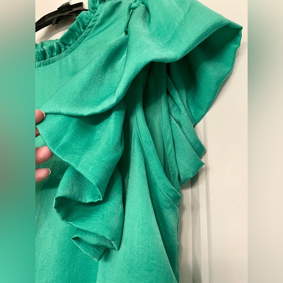 Glam green top with beautiful frill detail around neck & arms. Size L - Picture 7 of 7